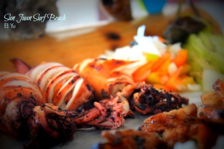 Grilled squid... grilled pork... sliced tomatoes and white onions... 